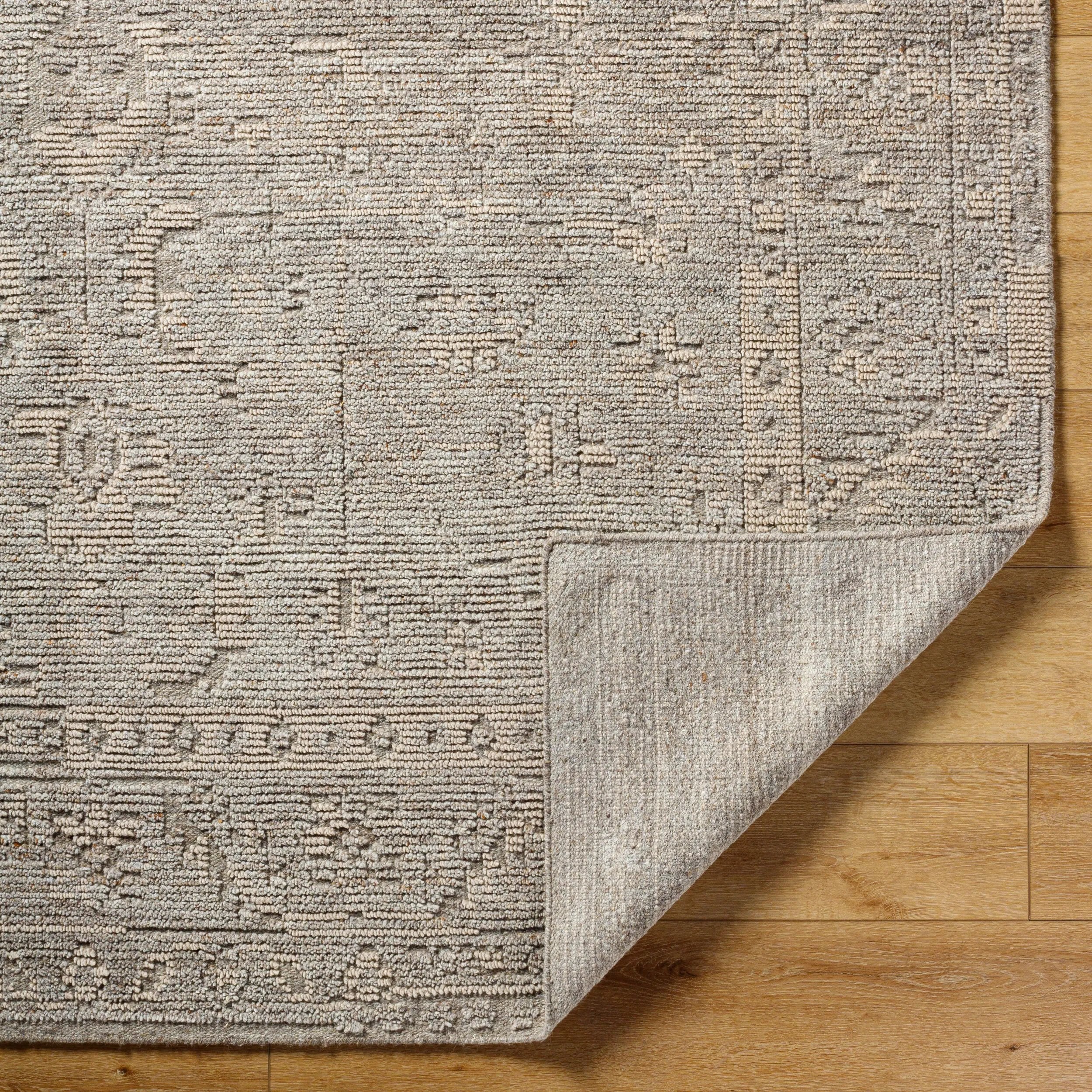 Experience the stunning beauty of the Kimberly collection with our hand-knotted wool rug. This updated traditional style rug, made in India, boasts an impressive medium pile that feels incredible underfoot. With its rich texture and timeless design, it's sure to become a focal point in your space. Amethyst Home provides interior design, new home construction design consulting, vintage area rugs, and lighting in the Boston metro area.