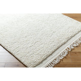 Introducing the Mabel Collection, where Country Cottage meets chic comfort. This handmade rug boasts a high pile construction, hand-woven from pure wool in the heartland of India, ensuring a plush and comfortable surface to walk on. It comes with an appealing fringe detail that adds a touch of rustic charm to any room. Amethyst Home provides interior design, new home construction design consulting, vintage area rugs, and lighting in the Laguna Beach metro area.