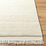 Introducing the Mabel Collection, where Country Cottage meets chic comfort. This handmade rug boasts a high pile construction, hand-woven from pure wool in the heartland of India, ensuring a plush and comfortable surface to walk on. It comes with an appealing fringe detail that adds a touch of rustic charm to any room. Amethyst Home provides interior design, new home construction design consulting, vintage area rugs, and lighting in the Park City metro area.