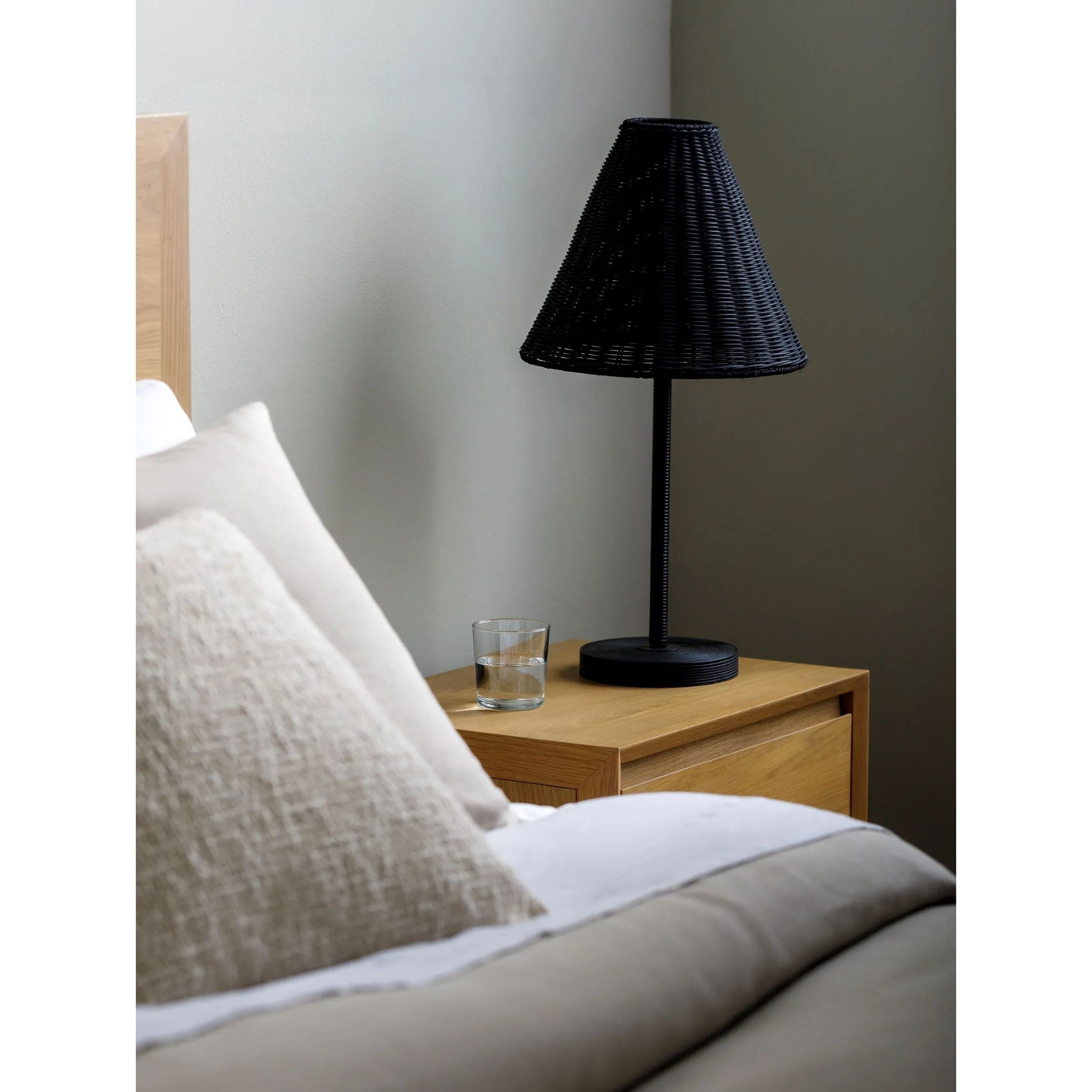 Featuring Safe Accent Table Lamp by Surya at Amethyst Home. Introducing the Safe Accent Table Lamp, a minimalist modern masterpiece that blends functionality and artistry. This lamp stands 25 inches tall, sculpted from iron for the body and a sturdy resin base, giving it a robust yet sleek profile. The shade is made of natural rattan, adding an organic touch to. Amethyst Home provides interior design, new home construction design consulting, vintage area rugs, and lighting in the Tampa metro area.