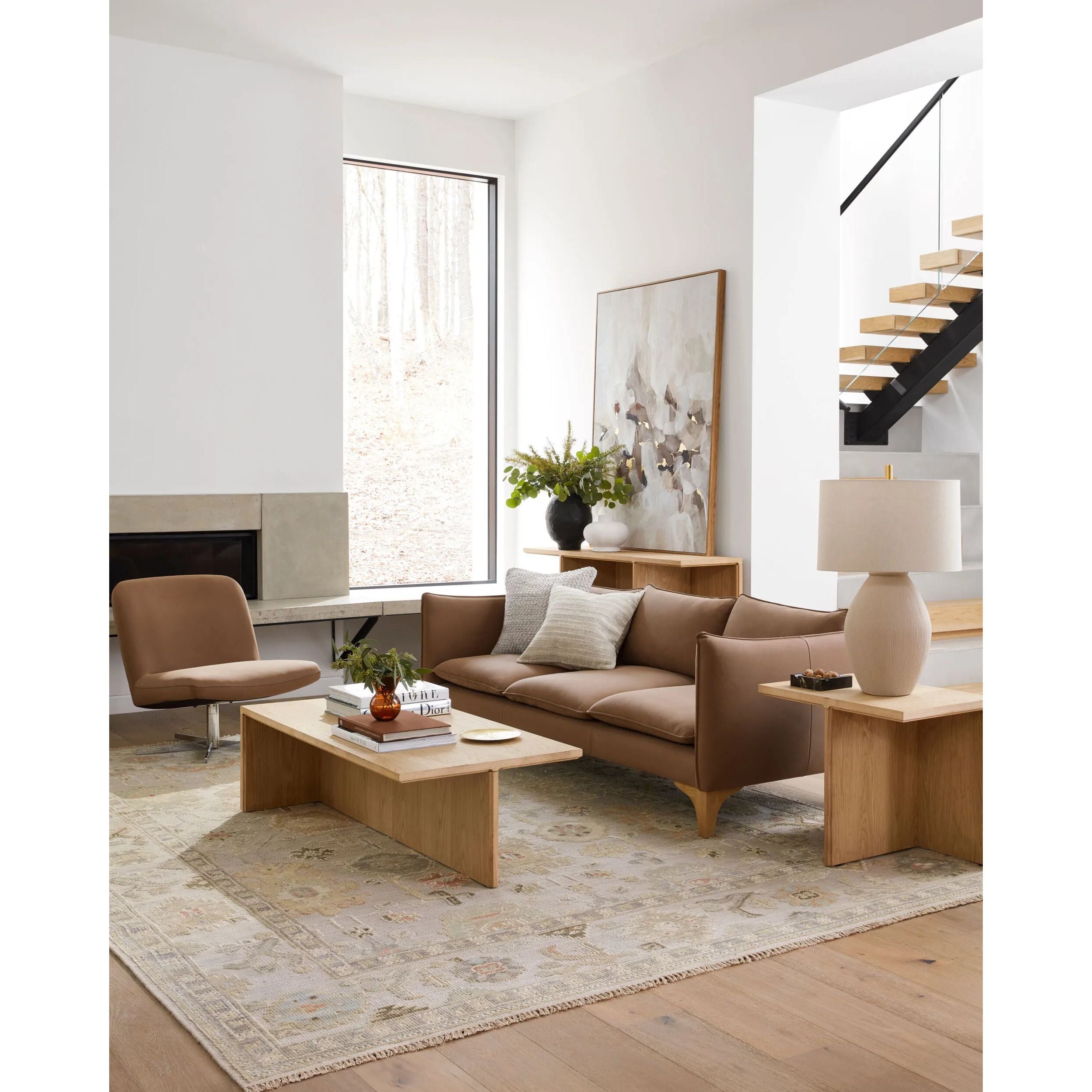 Introducing the Sinclair, an exquisite handmade rug that brings a touch of farmhouse cottage charm to any room. This piece is meticulously hand-knotted in India from wool, ensuring a medium pile that's both comfortable underfoot and durable for high traffic areas. To further enhance its longevity, we recommend using it with a rug pad. Amethyst Home provides interior design, new home construction design consulting, vintage area rugs, and lighting in the Tampa metro area.