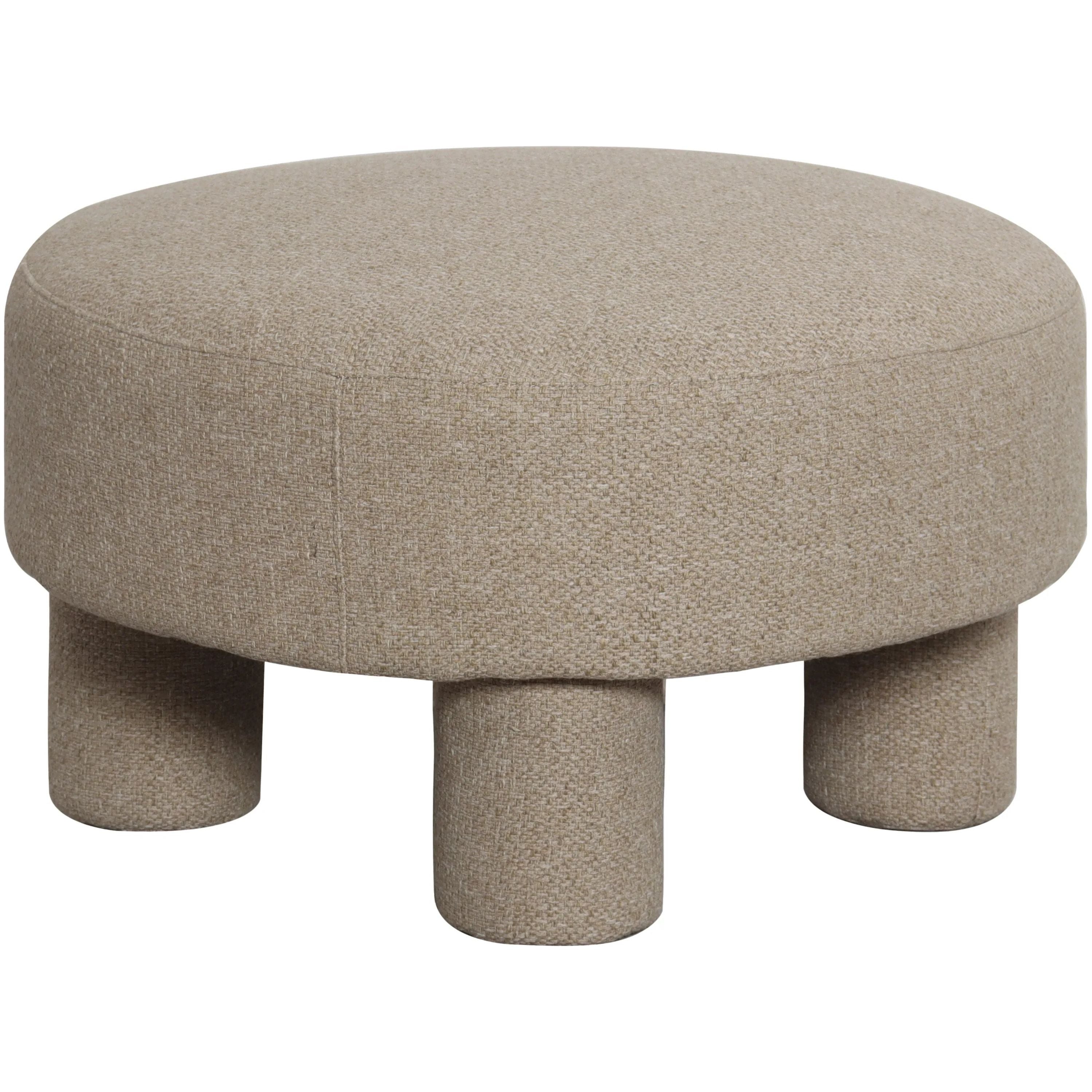 Featuring Welly Ottoman by Surya at Amethyst Home. The Welly Ottoman is a versatile and functional addition to any living space. Its sleek design allows for use as a footrest, extra seating, or even a small side table. Made with high-quality materials, this ottoman is both sturdy and stylish. Elevate your home decor with the Welly Ottoman.Top: 70% Recycled . Amethyst Home provides interior design, new home construction design consulting, vintage area rugs, and lighting in the Calabasas metro area.