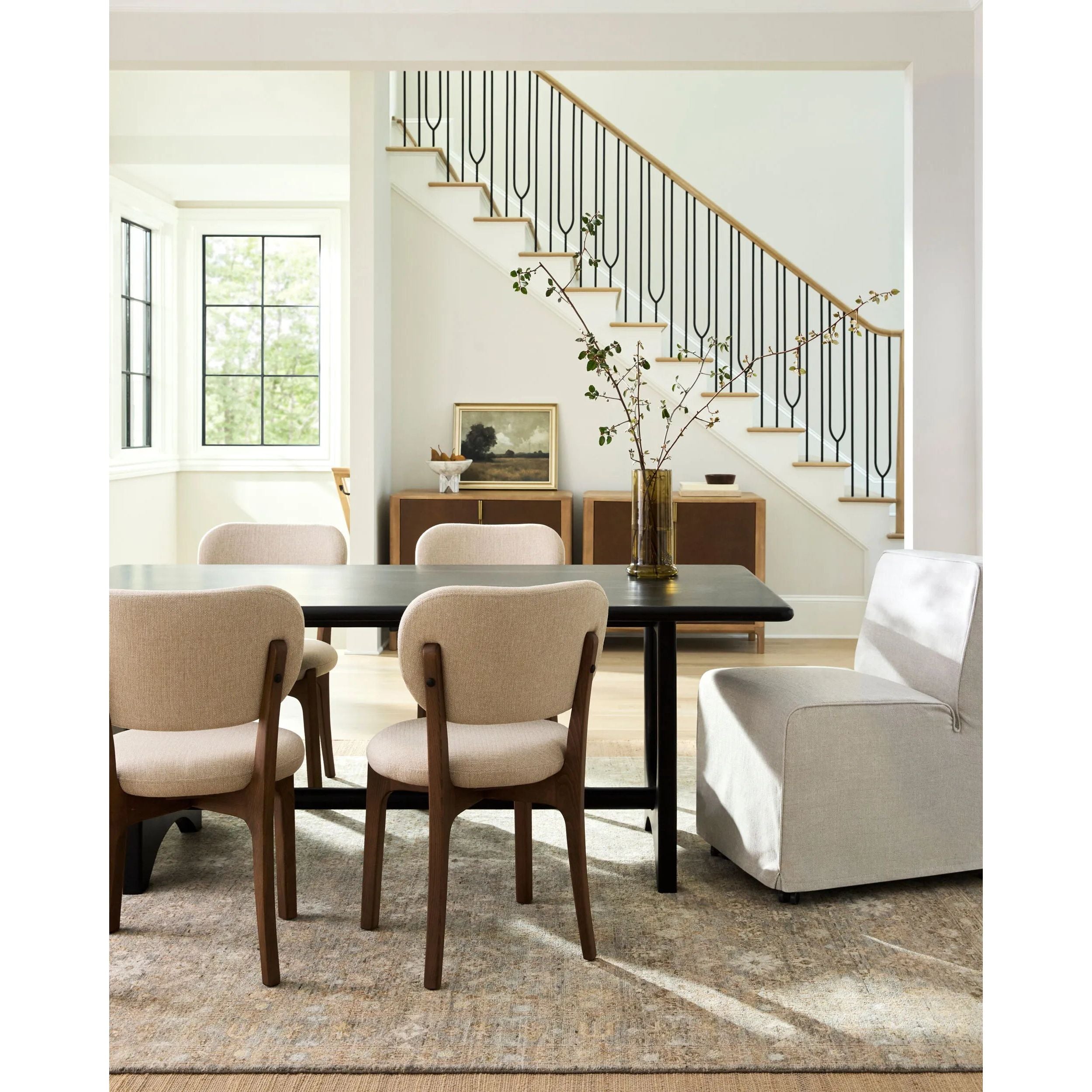 Experience the allure of traditional Indian design with the Zeenat handmade rug. Artfully hand-knotted from plush wool, this stunning piece boasts a low pile for an invitingly soft underfoot feel. It also features a charming fringe detail that adds a touch of warmth and character to any room. Amethyst Home provides interior design, new home construction design consulting, vintage area rugs, and lighting in the Newport Beach metro area.