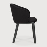 Featuring Unda Charcoal Oak Black Dining Chair by Ethnicraft at Amethyst Home. Experience dining comfort like never before with the Unda. Defined by its blend of materials, fluid lines and crafted piping trace the contours of the upholstered shell. Designed by Studio Segers, known for their pure and honest approach, every detail—down to the uniquely shaped legs—reflects sophistica. Amethyst Home provides interior design, new construction, custom furniture, and area rugs in the San Diego metro area