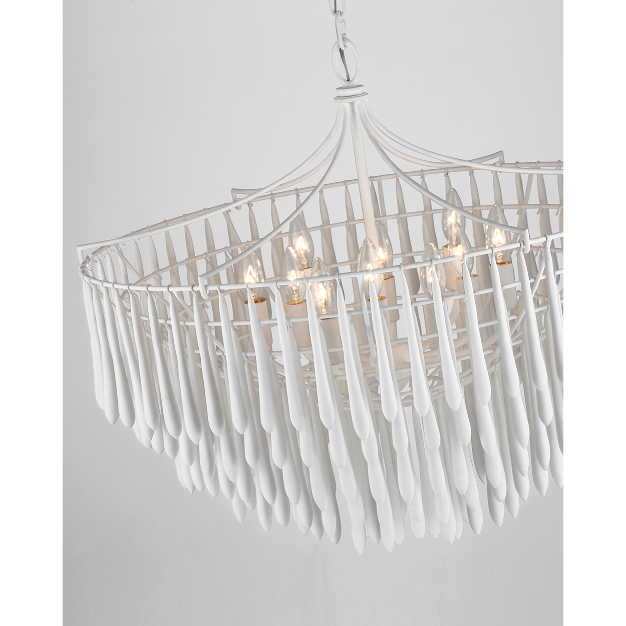 Featuring Vacarro Medium Chandelier Plaster White by Visual Comfort at Amethyst Home. The Vacarro by Julie Neill transforms classic basket chandeliers into a new and unique design statement. Hanging from the basket frame are sculptural, elongated plaster teardrops that create an unexpected texture while light emanates from within the basket. Available in all white or with a metal. Amethyst Home provides interior design, new construction, custom furniture, and area rugs in the Des Moines metro area