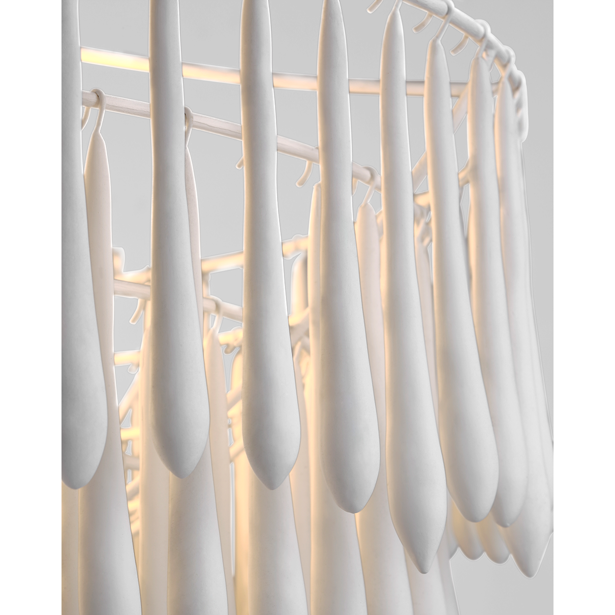 Featuring Vacarro Medium Chandelier Plaster White by Visual Comfort at Amethyst Home. The Vacarro by Julie Neill transforms classic basket chandeliers into a new and unique design statement. Hanging from the basket frame are sculptural, elongated plaster teardrops that create an unexpected texture while light emanates from within the basket. Available in all white or with a met. Amethyst Home provides interior design, new construction, custom furniture, and area rugs in the Laguna Beach metro area