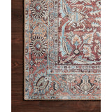 The Wynter Tomato / Teal area rug showcases a one-of-a-kind vintage or antique area rug look power-loomed of 100% polyester. This rug brings in tones of red, orange, blue, and ivory. The rug is ideal for high traffic areas due to the rug's durability for living rooms, dining rooms, kitchens, hallways, and entryways.