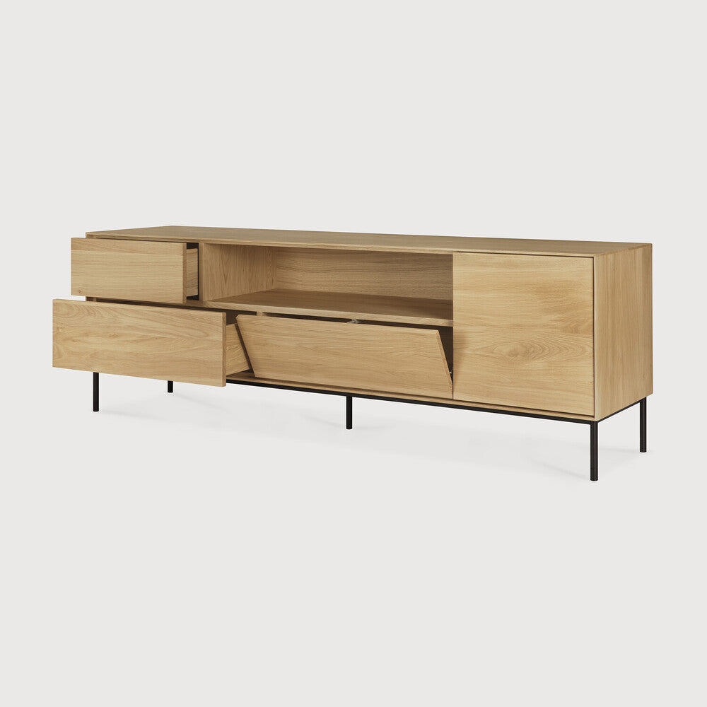 Featuring Whitebird Oak Tv Cupboard by Ethnicraft at Amethyst Home. For our Whitebird collection, designer Alain van Havre brings together opposing elements, combining soft round legs and eye-catching graphic lines into light and airy designs.Weight : 183 lbDimensions: 71 in L x 18 in D x 24.5 in HAnti-tipping mechanism : YesCollection : WhitebirdFinish : VarnishedMain Material : Oak. Amethyst Home provides interior design, new construction, custom furniture, and area rugs in the Austin metro area