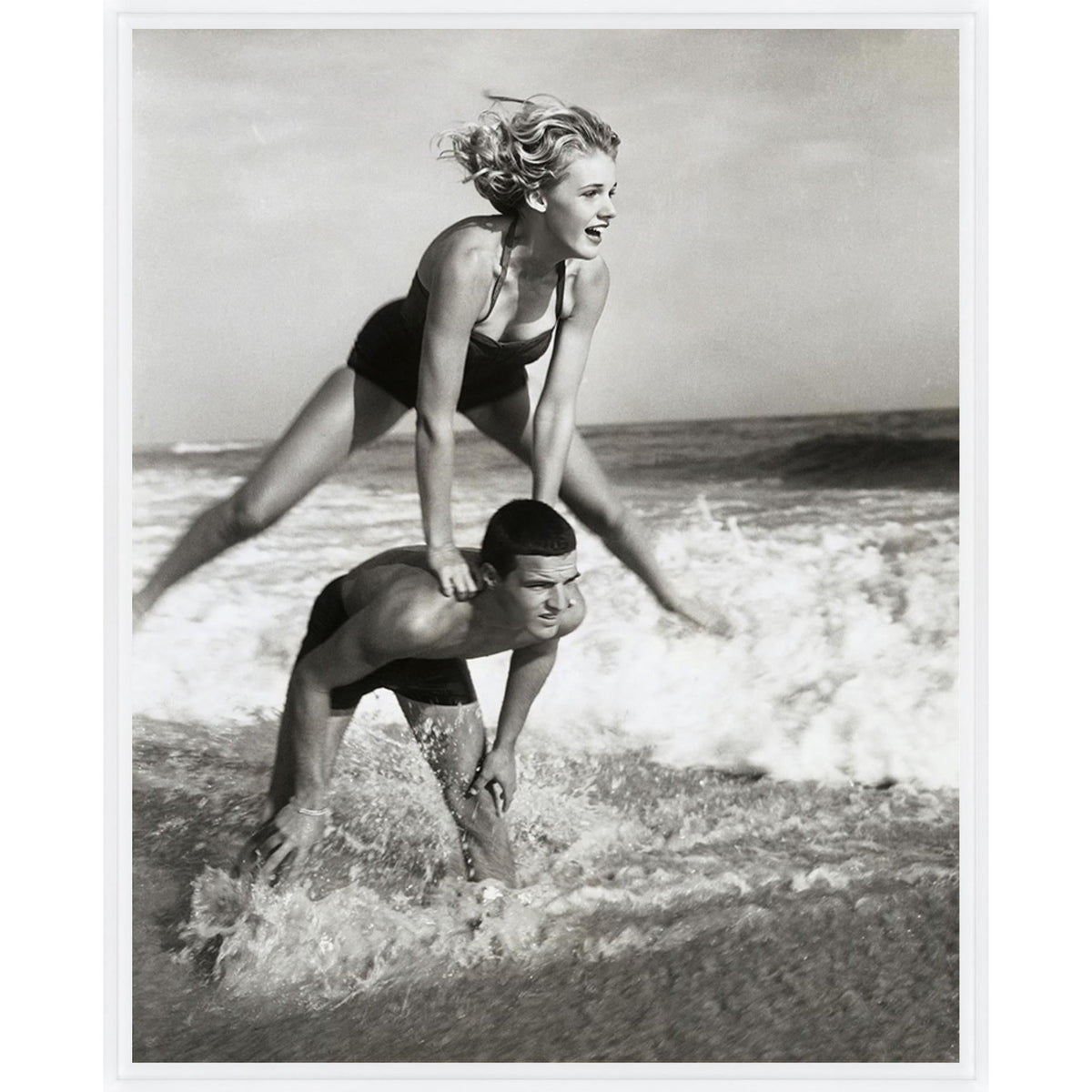 Young Couple Playing Leapfrog in Surf Art