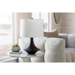 Featuring Brya Table Lamp by Surya at Amethyst Home. A touch of mid-century with a textured, interesting base -- the Bryant lamp is an Amethyst essential.
Overall Dimensions: 23"H x 12"W x 15"DSwitch Type: 3-WayNumber of bulbs: 1E-26/100 WUL CUL Certified.  Amethyst Home provides interior design, new home construction design consulting, vintage area rugs, and lighting in the Dallas metro area.