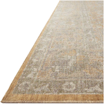 Durable, low pile, and soft underfoot, this rug is inspired by classic vintage and antique rugs. The Rosemarie Chris Loves Julia Gold / Sand ROE-01 rug from Loloi features a beautiful vintage pattern and patina. The rug is easy to clean, never sheds, and perfect for living rooms, dining rooms, hallways, and kitchens!