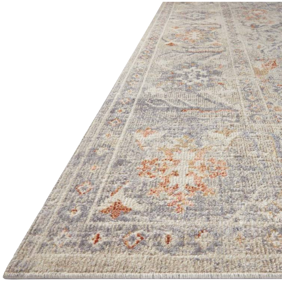 Durable, low pile, and soft, this rug is inspired by classic vintage and antique rugs. The Rosemarie Chris Loves Julia Oatmeal / Lavender ROE-05 rug from Loloi features a beautiful vintage pattern and patina. The rug is easy to clean, never sheds, and perfect for living rooms, dining rooms, hallways, and kitchens!