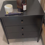 Bring a clean, beautifully industrial look to the bedroom with a three-drawer dresser made from black-finished iron, featuring bronzed iron hardware. Amethyst Home provides interior design, new home construction design consulting, vintage area rugs, and lighting in the Dallas metro area.