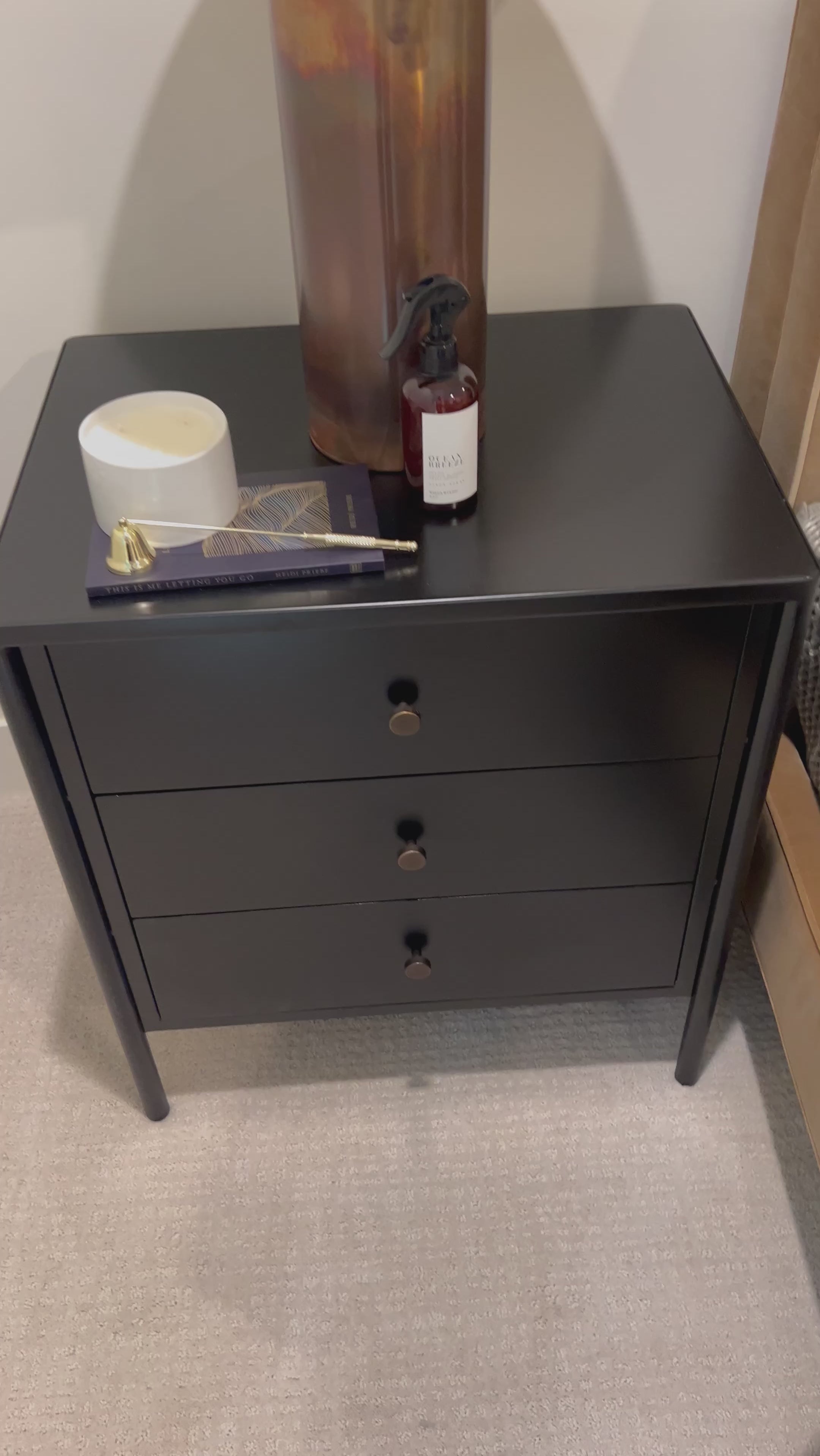 Bring a clean, beautifully industrial look to the bedroom with a three-drawer dresser made from black-finished iron, featuring bronzed iron hardware. Amethyst Home provides interior design, new home construction design consulting, vintage area rugs, and lighting in the Dallas metro area.