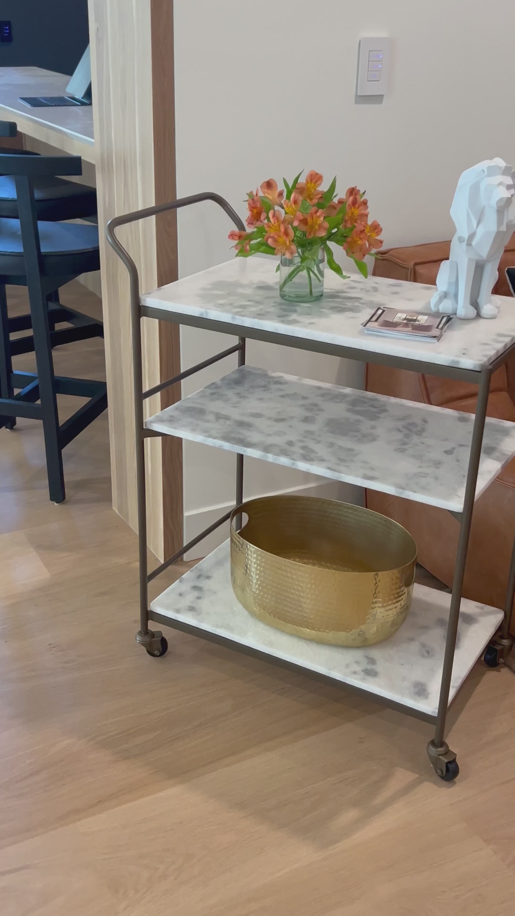 Entertain with style.  Beautiful natural marble shelves with a brass frame instantly infuses your space with style.Overall Dimensions: 30.00"w x 16.00"d x 36.25"hWeight : 85.98 lbsMaterials : Iron, Solid Marble Amethyst Home provides interior design, new home construction design consulting, vintage area rugs, and lighting in the Calabasas metro area.