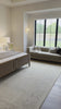 Dreamy woven panels is the perfect foundation for this warm, layered bed.  We love that this detail heavy look can make even the most sterile bedroom come to life. Amethyst Home provides interior design, new home construction design consulting, vintage area rugs, and lighting in the Scottsdale metro area.