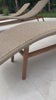Strike a pose. Based off a vintage shape, all-weather wicker is subtly curved and set atop a minimal frame made of solid teak. A stylish statement piece and seating option for both indoors and out. Cover or store inside during inclement weather and when not in use.Overall Dimensions: 24.00"w x 80.50"d x 27.50"hWeight : 55. Amethyst Home provides interior design, new home construction design consulting, vintage area rugs, and lighting in the Des Moines metro area.