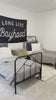 Vintage style for a classic bedroom look.  Durable, heavy iron makes for a supportive, wiggle-free bed. Amethyst Home provides interior design, new home construction design consulting, vintage area rugs, and lighting in the Charlotte metro area.