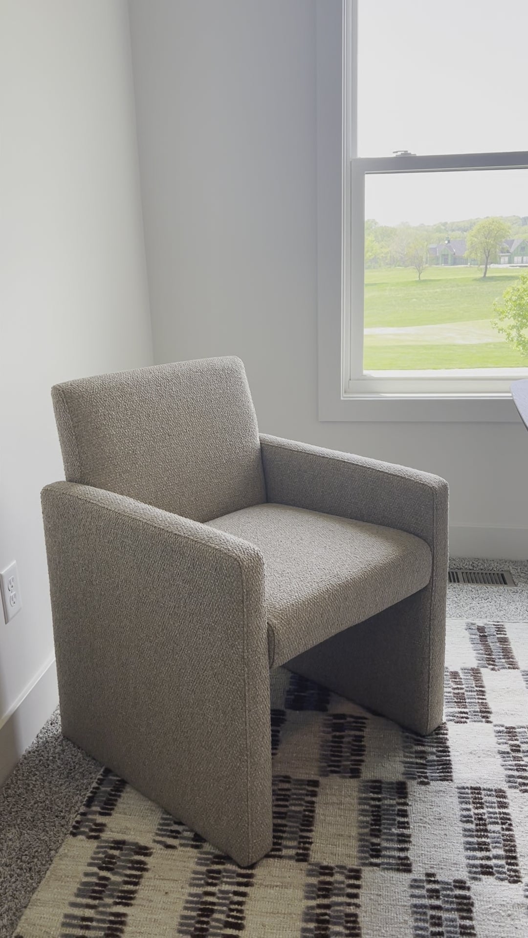 The loveliest camel textured dining chair.  Perfect for a modern dining room or pair with your favorite desk for all-day comfort. Amethyst Home provides interior design, new home construction design consulting, vintage area rugs, and lighting in the Des Moines metro area.
