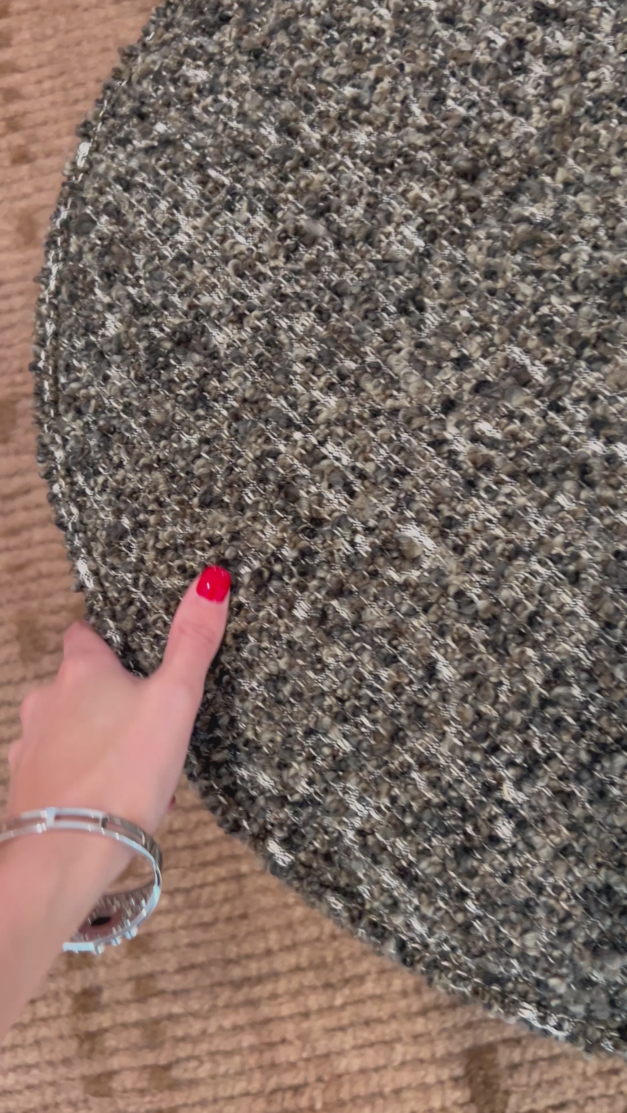 This round ottoman of textural upholstery can be placed just about anywhere, bringing with it a hip retro vibe.Overall Dimensions: 22.00"w x 22.00"d x 18.50"hWeight : 13.23 lbsMaterials : 60% Acrylic, 33% Cotton, 7% Polyester, Solid Parawood, 100% Polyester Amethyst Home provides interior design, new home construction design consulting, vintage area rugs, and lighting in the Washington metro area.