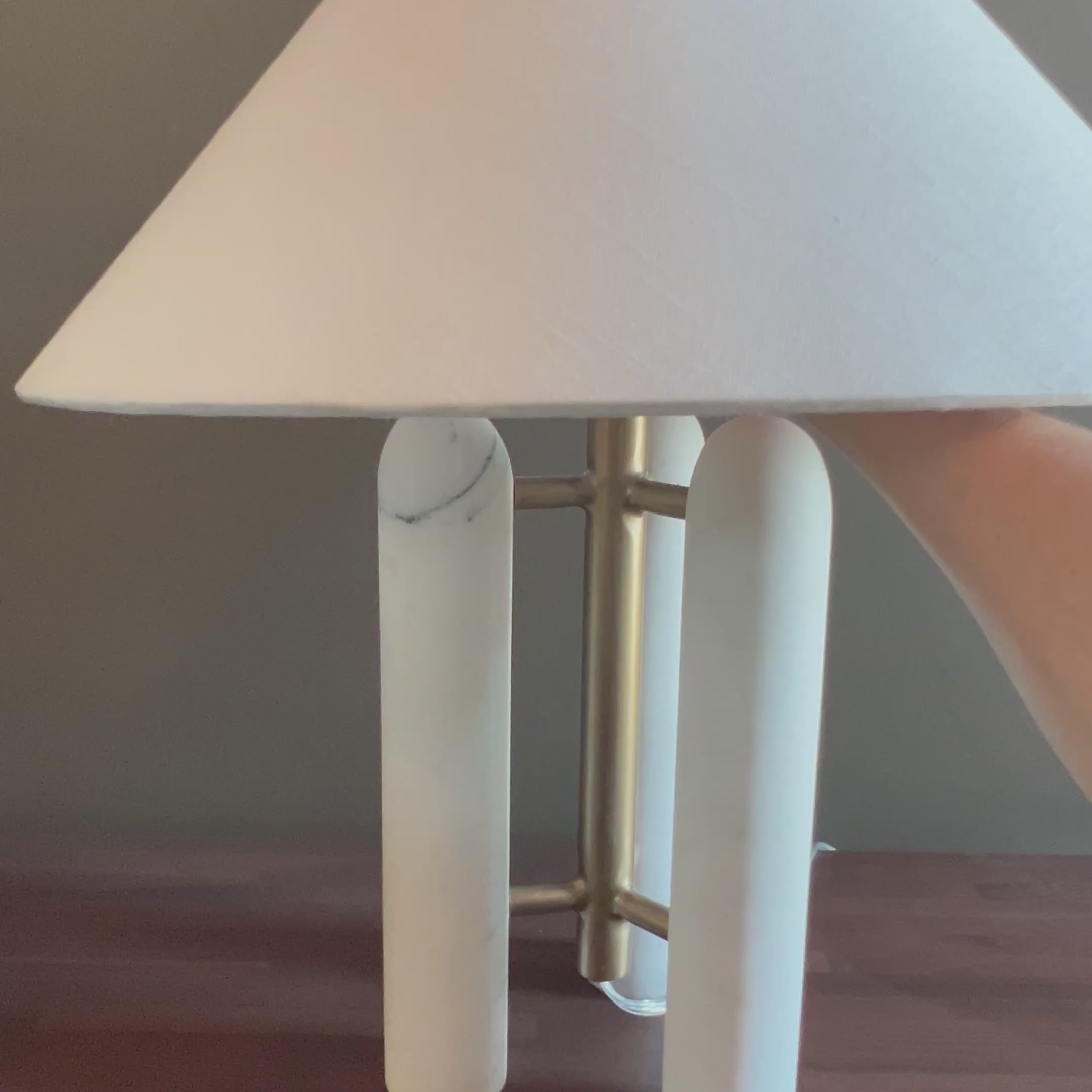 This stunning table lamp features three smooth Italian marble pillars, reminiscent of the marble columns found throughout Italy.Overall Dimensions: 18.00"w x 18.00"d x 21.00"hWeight : 14.10 lbsMaterials : Solid Marble, Stainless Steel, Thermoplastic Amethyst Home provides interior design, new home construction design consulting, vintage area rugs, and lighting in the Alpharetta metro area.