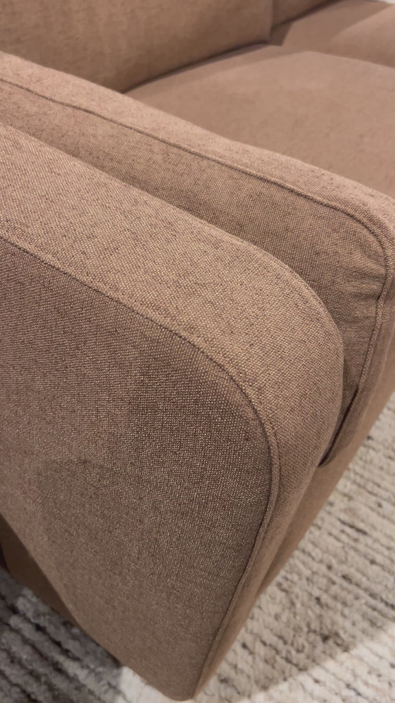 Inflated, pillow-inspired cushioning all around brings cozy comfort to the room. High-performance linen offers the best of both worlds on this plush and welcoming sofa. Inflated arms, feather-fiber blend cushioning and a soft, durable linen fabric make this spacious sofa a smart solution for the comfort-driven living space. Amethyst Home provides interior design, new home construction design consulting, vintage area rugs, and lighting in the Scottsdale metro area.