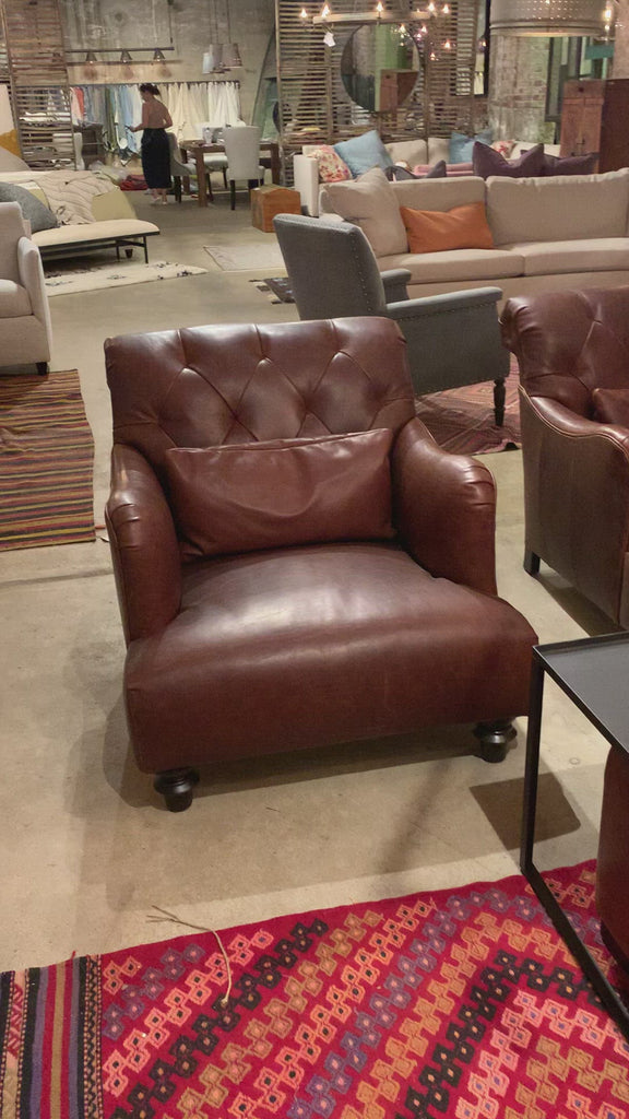 The Acacia Chair by Cisco Home is love at first sight & sit! An effortlessly cool, relaxed seat with conversational recline. Upholstered in a beautiful, natural leather that smells like leather!  Wears beautifully. Amethyst Home provides interior design, new home construction design consulting, vintage area rugs, and lighting in the Park City metro area.