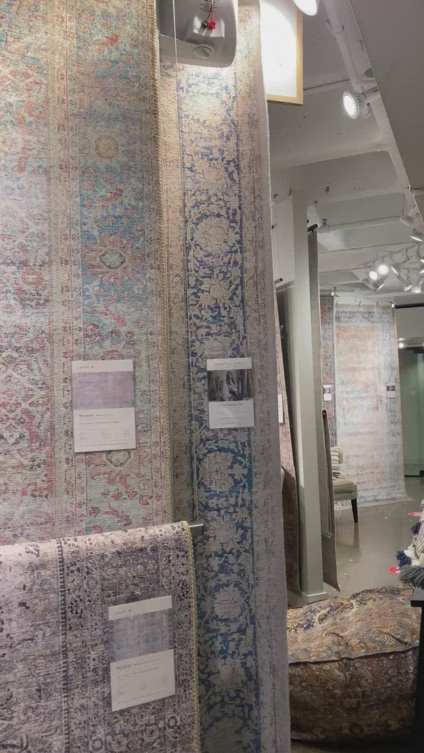 Load video: Old soul, new spirit. Power-loomed of 100% polyester, the Wynter Red / Teal area rug showcases a one-of-a-kind vintage or antique area rug look at an affordable price. This rug brings in tones of pink, blue, and ivory and ideal for high traffic areas due to the rug&#39;s durability. The rug is perfect for living rooms, dining rooms, kitchens, hallways, and entryways.  Power Loomed 100% Polyester WYN-04 Red/Teal Colors: Pink, Ivory, Blue