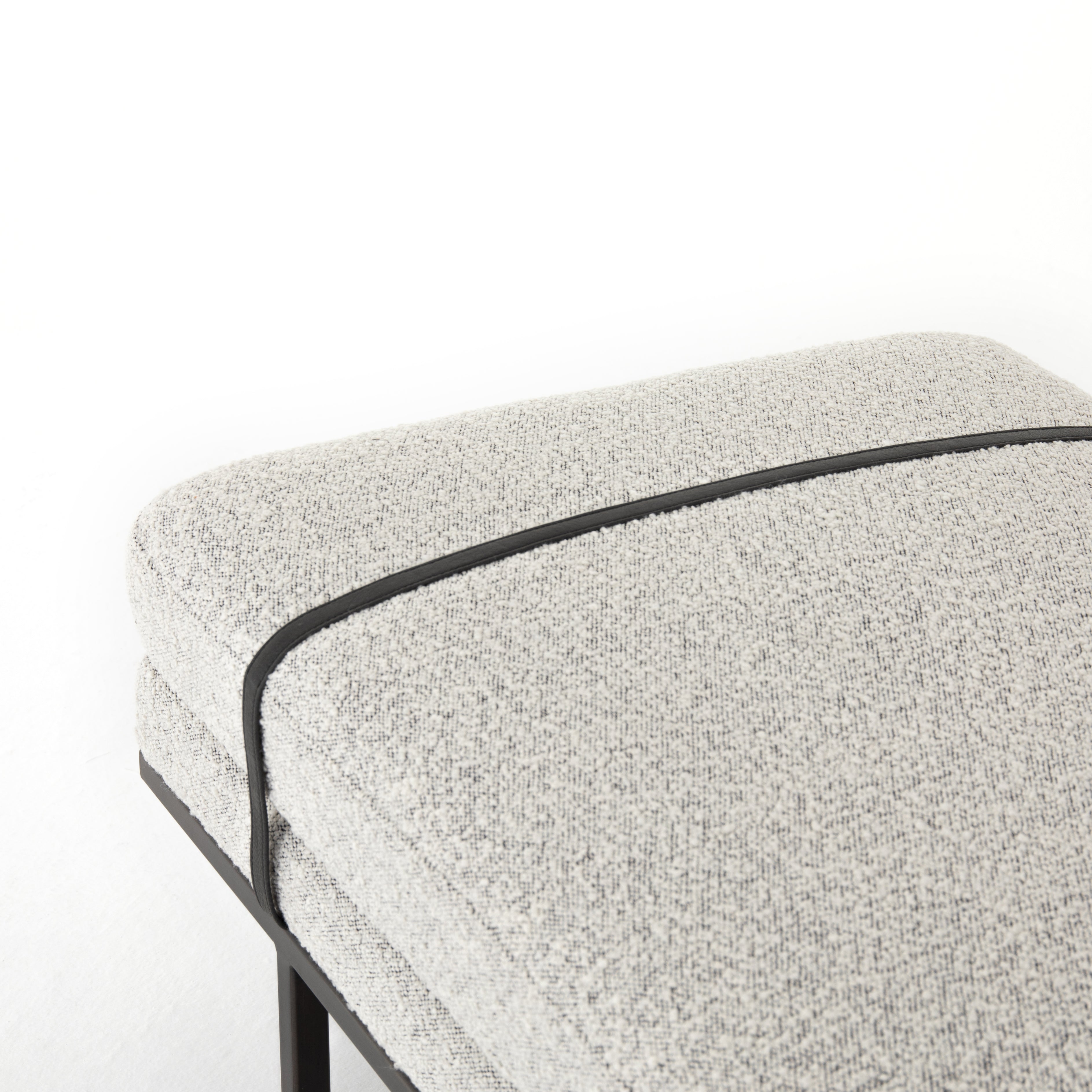 Make a chic statement with the Harris Knoll Domino Accent Bench. Decorative straps of black top-grain leather take chaise-style bench seating to the next level. Airy, elongated legs lend a look of lightness for balance.  Available late September 2020!  Overall Dimensions: 60"w x 26"d x 19.25"h Materials: Solid Parawood