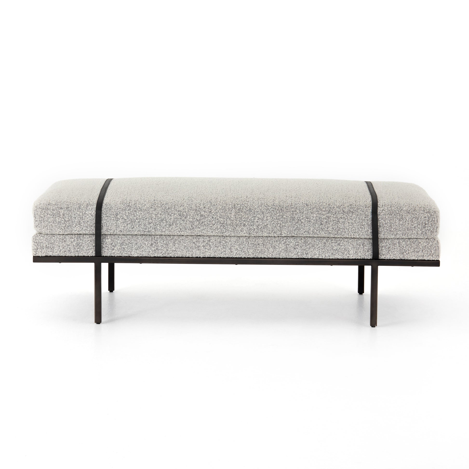 Make a chic statement with the Harris Knoll Domino Accent Bench. Decorative straps of black top-grain leather take chaise-style bench seating to the next level. Airy, elongated legs lend a look of lightness for balance.  Available late September 2020!  Overall Dimensions: 60"w x 26"d x 19.25"h Materials: Solid Parawood