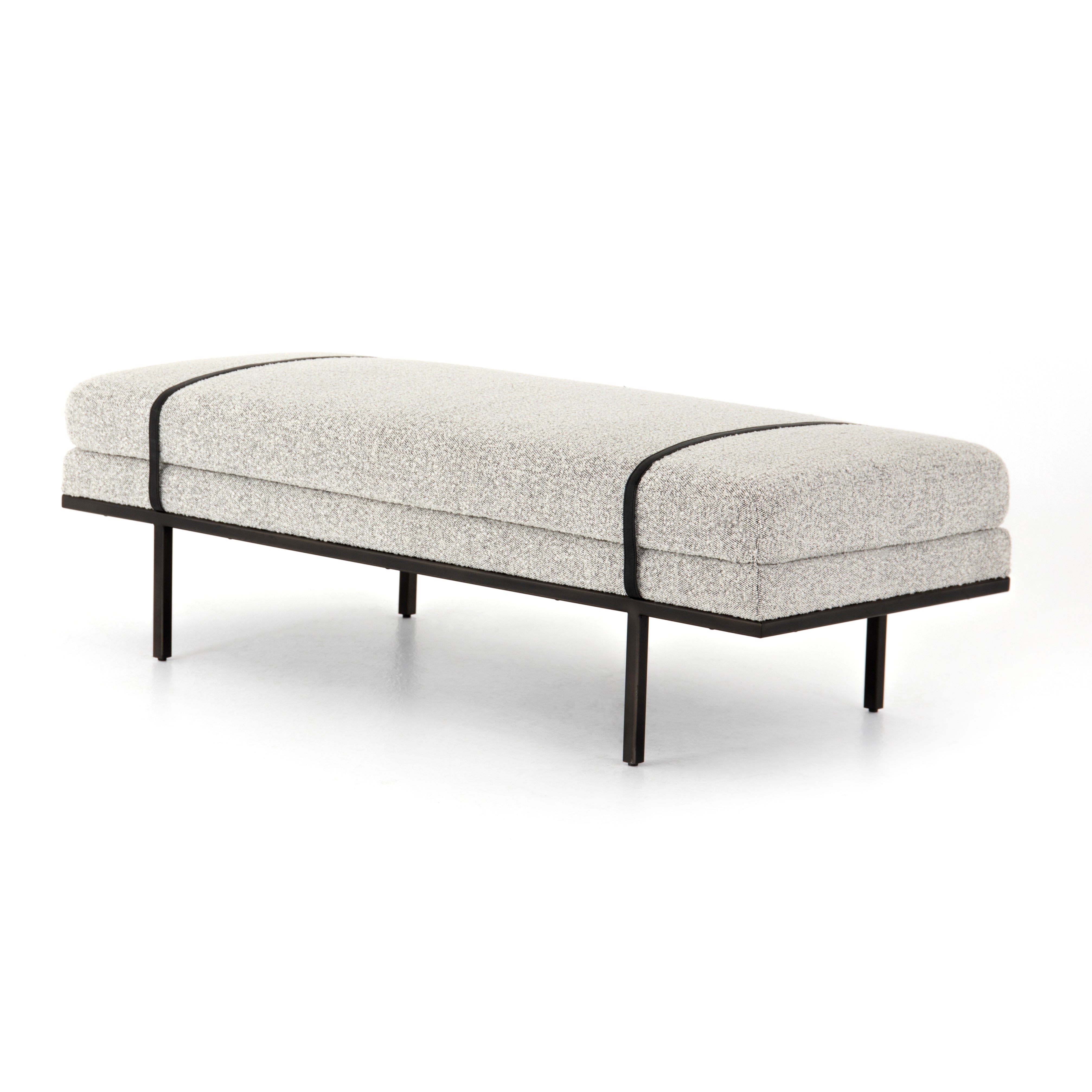 Make a chic statement with the Harris Knoll Domino Accent Bench. Decorative straps of black top-grain leather take chaise-style bench seating to the next level. Airy, elongated legs lend a look of lightness for balance.  Available late September 2020!  Overall Dimensions: 60"w x 26"d x 19.25"h Materials: Solid Parawood