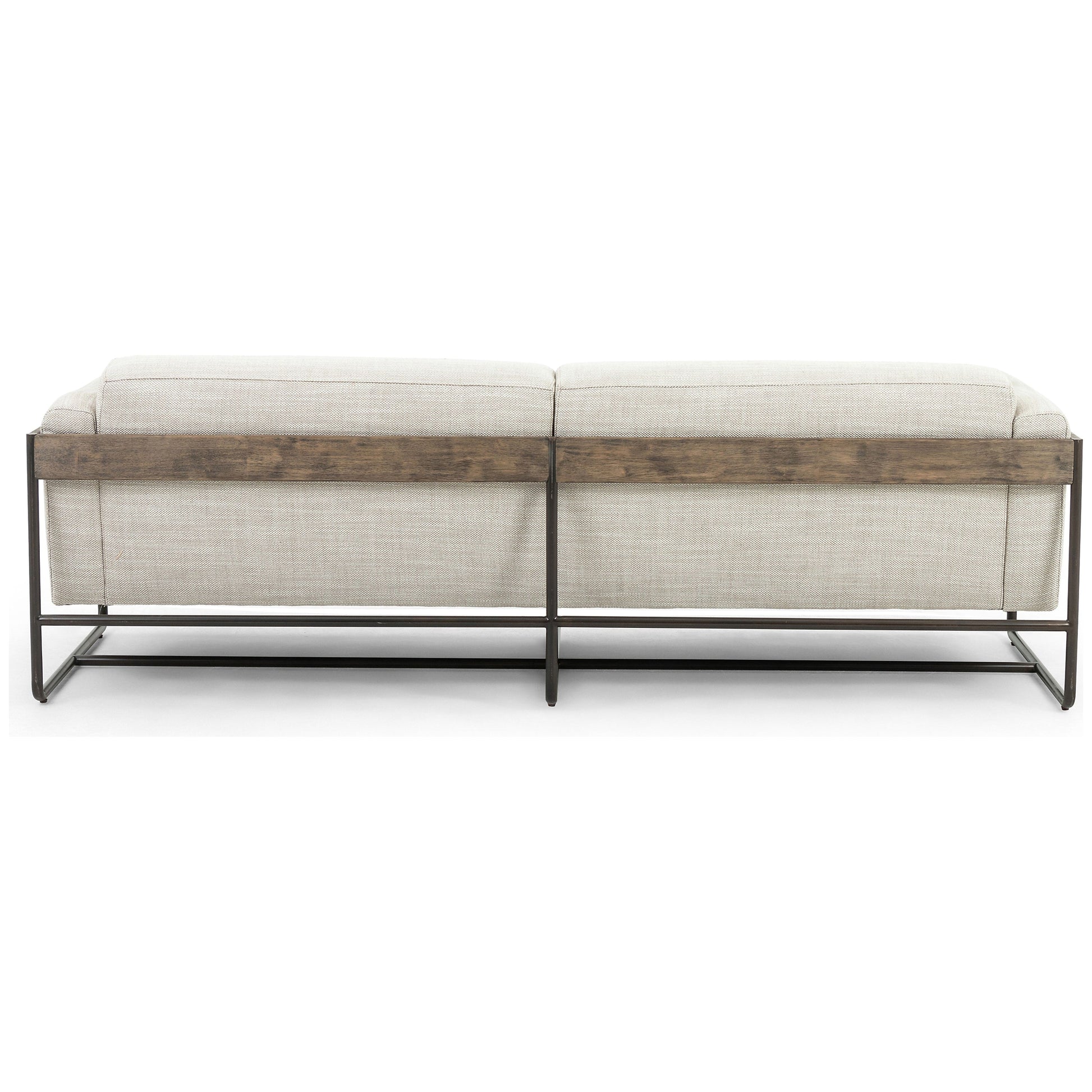 Neutral gone novel with this Ella Gable Taupe 91" Sofa. Taupe-colored upholstered seating is suspended by top-grain leather straps with handcrafted fastens, for an airy look. Solid rubberwood paneling wraps the frame’s entirety, while a black iron base lends lightness and contrast.  Available early October 2020!  Overall Dimensions: 91.00"w x 37.50"d x 30.25"h Materials: 82% Pl 16% Pc 2%Wo, Iron, 100% Top Grain Leath, Solid Parawood