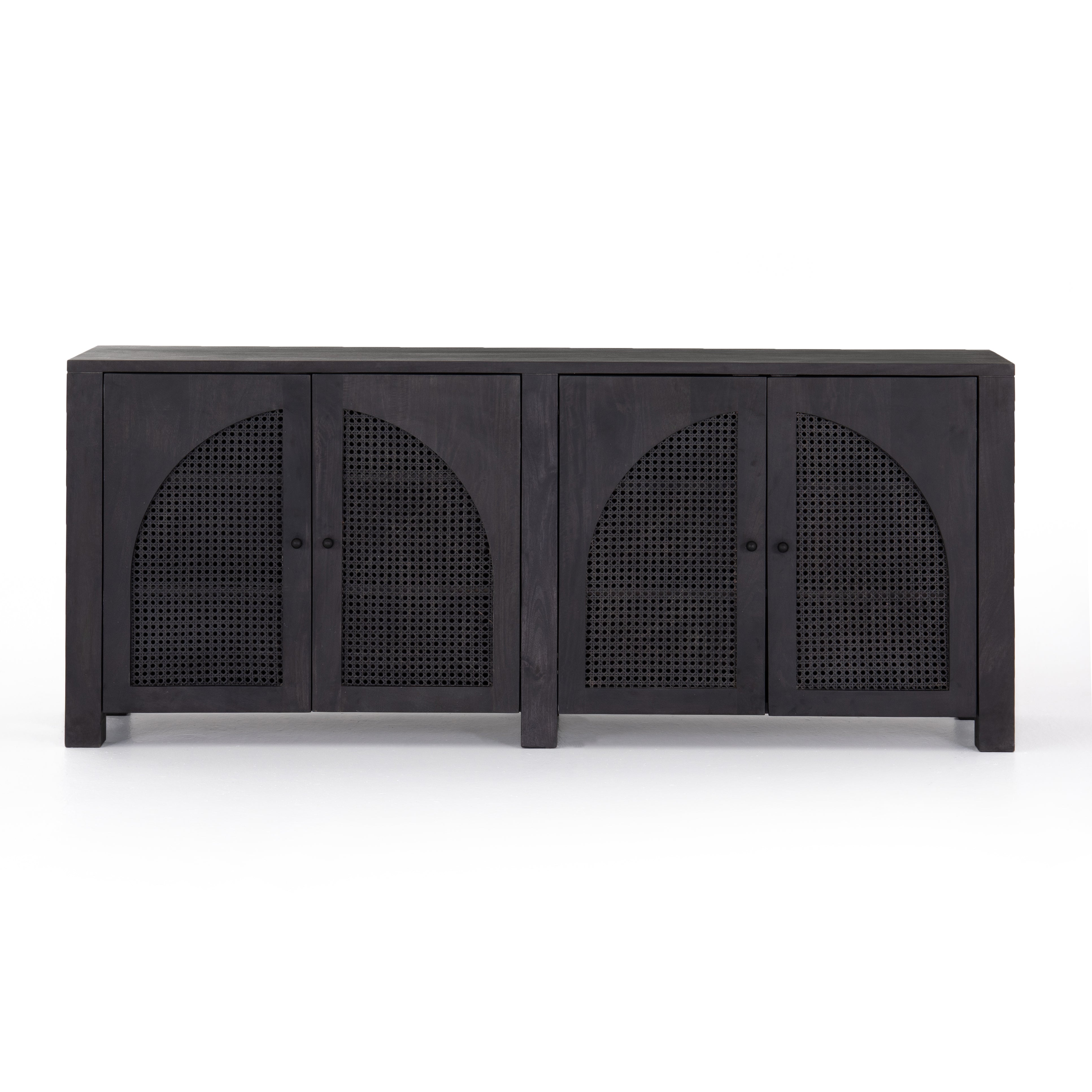 We love the textural cane door panels of the Tilda Black Wash Mango Sideboard. Store all your media needs while also adding a beautiful, monochromatic vibe to the room  Size: 78"w x 18"d x 33"h Materials: Solid Mango, Iron, Cane