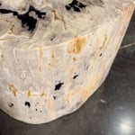 The Kos Dark Petrified Wood End Table is perfect to place in your living and make in come to live with it's design. Amethyst Home provides interior design, new home construction design consulting, vintage area rugs, and lighting in the Portland metro area.