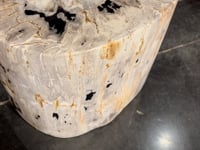 The Kos Dark Petrified Wood End Table is perfect to place in your living and make in come to live with it's design. Amethyst Home provides interior design, new home construction design consulting, vintage area rugs, and lighting in the Portland metro area.