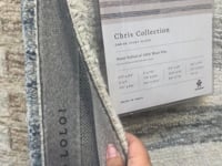 Known for its durability, the Chris Ivory / Slate hooked wool rug is a smart choice for any room in your home that gets lots of love. The subtle, tonal stripes remind us of our favorite California cool hemp rugs. Amethyst Home provides interior design services, furniture, rugs, and lighting.