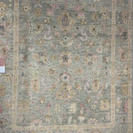 The Helena Sage / Sunset HEL-03 rug from Loloi is hand-knotted of 100% wool, refined, yet versatile for any home. The Helena rug combines weathered tones and worldly patterns for a beautiful grounding element in any room. Amethyst Home provides interior design, new construction, custom furniture, and rugs for the Omaha and Lincoln metro area.