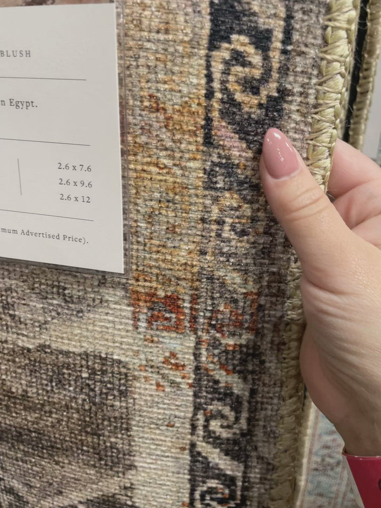 Old soul, new spirit. Power-loomed of 100% polyester, the Wynter Graphite / Blush Area Rug showcases a one-of-a-kind vintage or antique area rug look at an affordable price. The rug is perfect for living rooms, dining rooms, kitchens, hallways, and entryways.  Power Loomed 100% Polyester WYN-08 Graphite/Blush