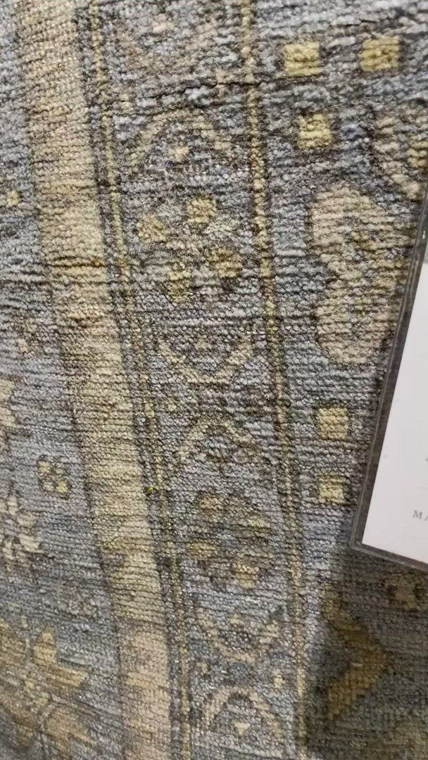 Load video: The Legacy Ocean rug from Loloi is hand-knotted, refined, yet versatile for any home. The Legacy rug is deliberately distressed and sheared down to an extra low pile of 100% wool, creating a patina usually only imparted through decades of wear.  This rug features: - Beautiful vintage look and patina - Extra low pile - Easy to clean and maintain - Perfect for living and dining rooms, hallways, and extra large spaces  Hand-Knotted 100% Wool LZ-03 Ocean