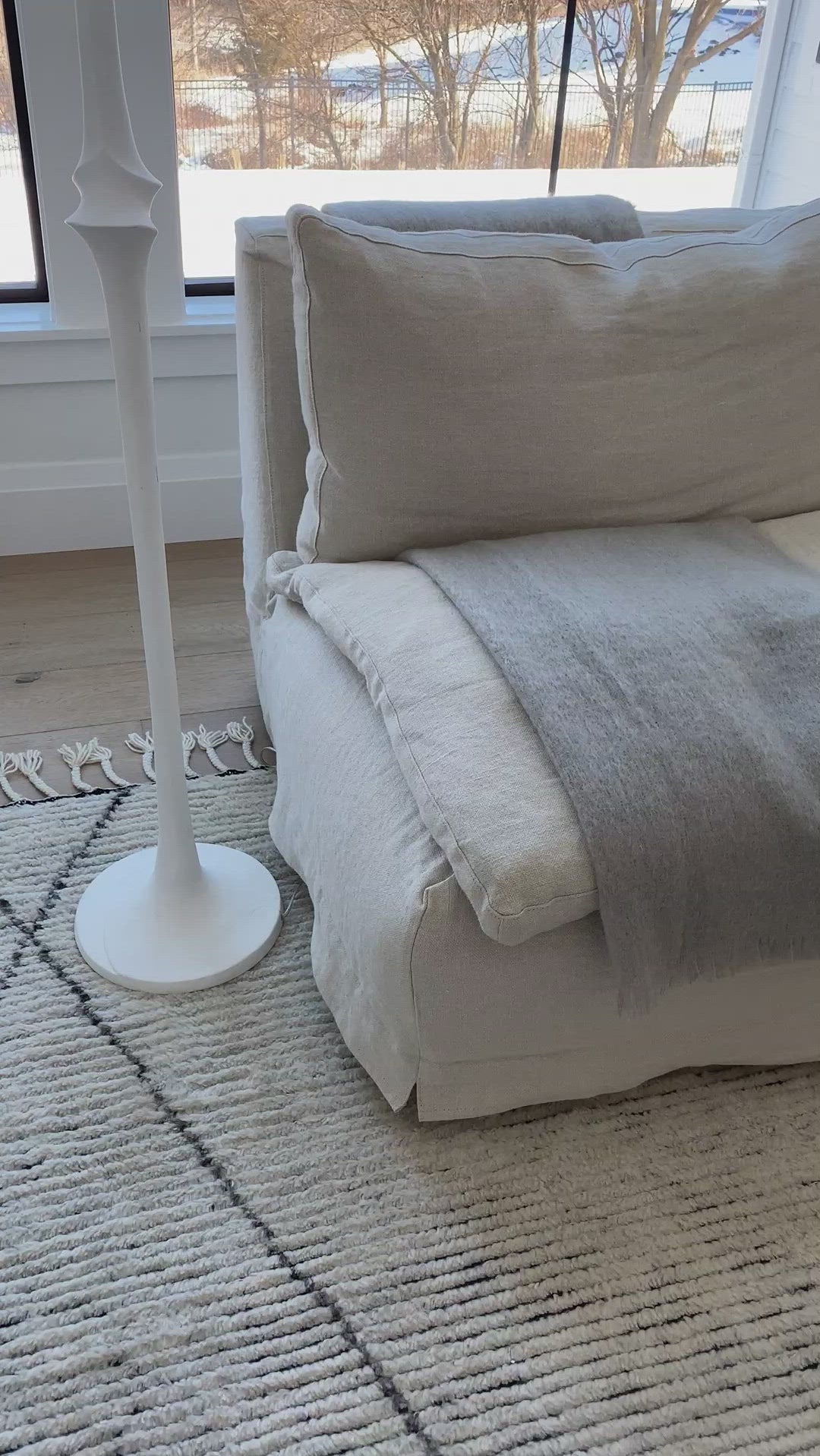 Inspired by textiles from the Tullu region in Morocco, the Alpine brings texture and versatility to both global and modern spaces. Crafted of natural wool, the hand-knotted Ammil rug features a plush, ridged feel and an asymmetrical trellis design in cream and black tones.  Hand-Knotted 100% Wool ALP03 Alpine Ammil Rug