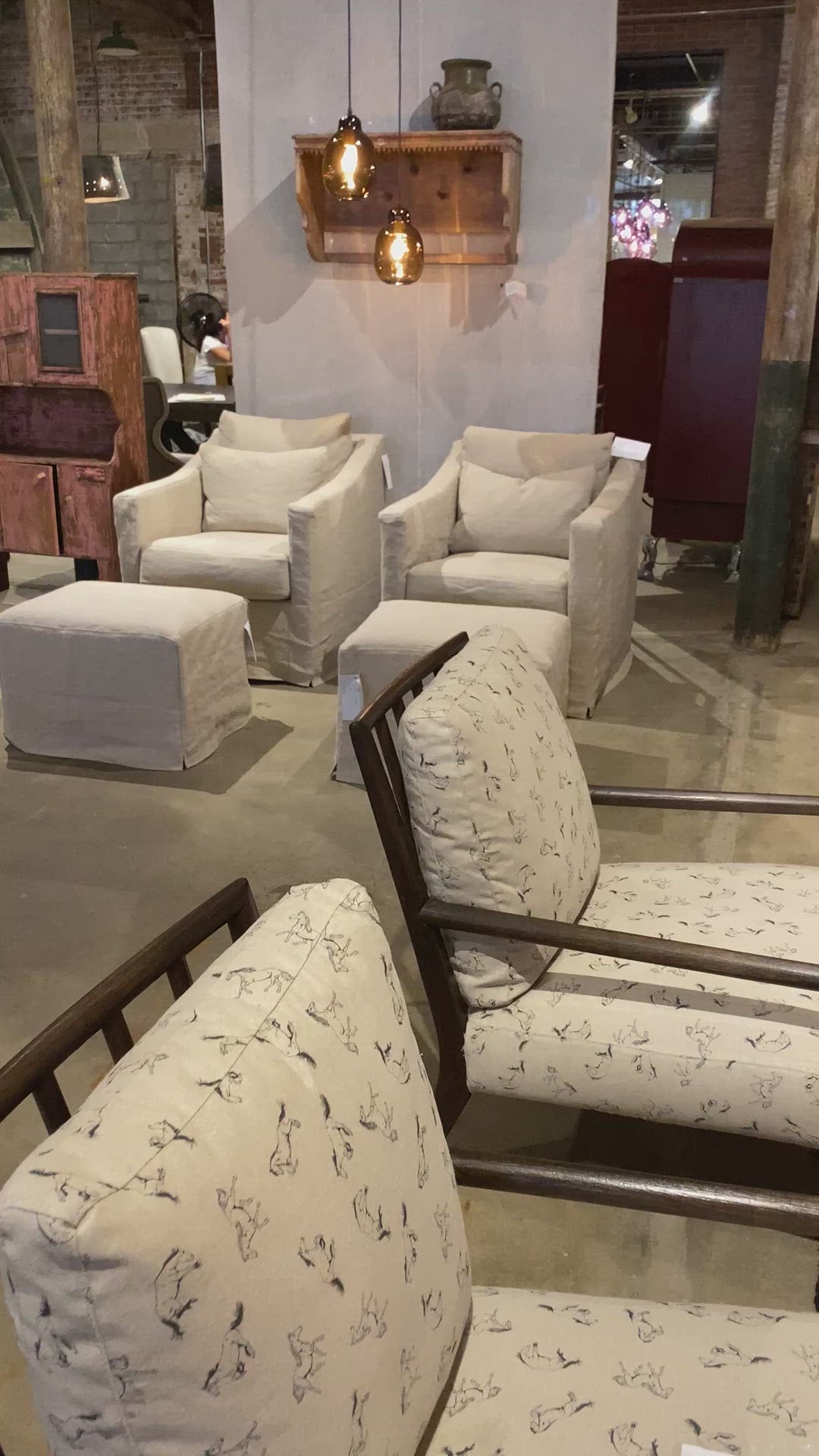 Load video: The Rebecca Chair by Cisco Brothers has a stunning silhouette draped in a graceful slip skirt with a neat kick-pleat detail. With a lumbar pillow for extra comfort, this tranquil chair will bring relaxation and ease into your home. Photographed in Denim White. Amethyst Home provides interior design, new home construction design consulting, vintage area rugs, and lighting in the Scottsdale metro area.