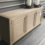 Take outdoor storage to the next level with this Sonoma Outdoor Sideboard - Weathered Grey. Finished in a weathered grey, solid FSC-certified teak forms a modern-minded sideboard, with slatted fronts for a light, linear look. Cover or store indoors during inclement weather and when not in use.  Overall Dimensions: 70.00"w x 18.00"d x 30.00"h