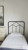 Vintage style for a classic bedroom look.  Durable, heavy iron makes for a supportive, wiggle-free bed. Amethyst Home provides interior design, new home construction design consulting, vintage area rugs, and lighting in the Calabasas metro area.