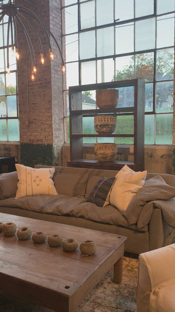 This cozy Donato Sofa from Cisco Brothers is our favorite! As shown slipcovered in Mariet White 100% linen fabric. Amethyst Home provides interior design, new home construction design consulting, vintage area rugs, and lighting in the Portland metro area.
