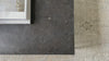 Spare beauty, casual elegance with the Harlow Bluestone Small Coffee Table. A gunmetal Parson's base with hand-rubbed, dimensional edges supports a rough-hewn bluestone slab that feels found and perfectly placed.  Size: 60"w x 28"d x 17"h