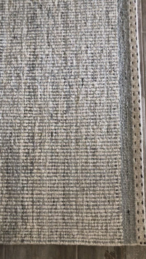 A perfect blend of refined and relaxed, the Sloane Collection is hand-woven of wool, cotton and polyester by artisans in India. Sloane offers a sophisticated foundation for a contemporarily bohemian look with perfectly woven stripes and minimalist appeal.  Hand Woven 79% Wool | 10% Cotton | 8% Polyester | 3% Other Fibers SLN-01 Mist
