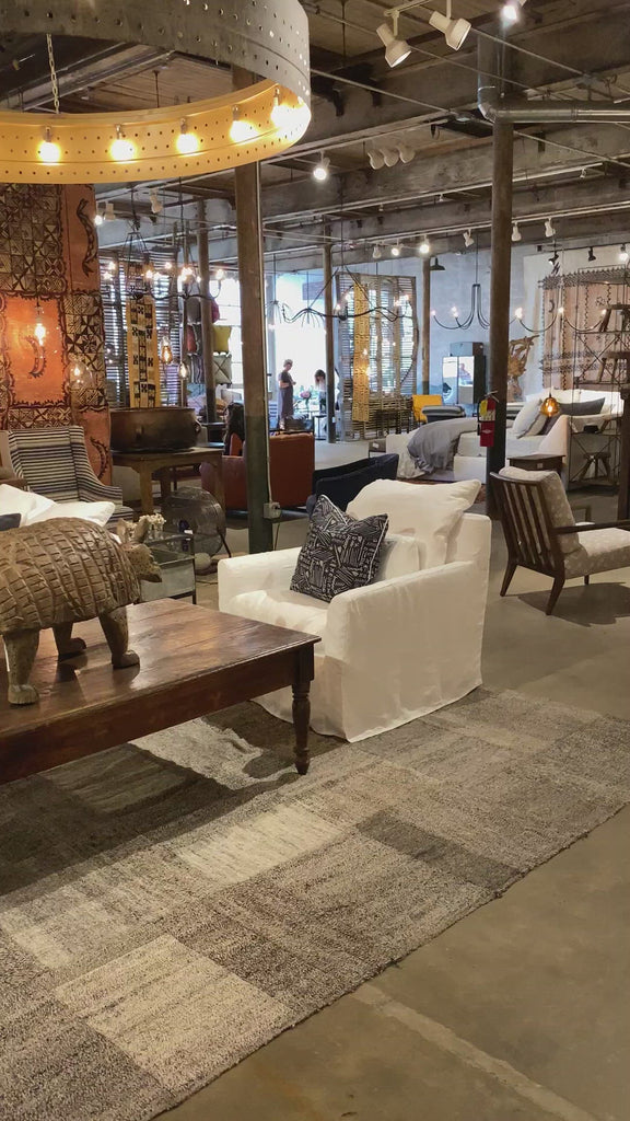 This cozy Donato Sofa from Cisco Brothers is our favorite! As shown slipcovered in Mariet White 100% linen fabric. Amethyst Home provides interior design, new home construction design consulting, vintage area rugs, and lighting in the Park City metro area.