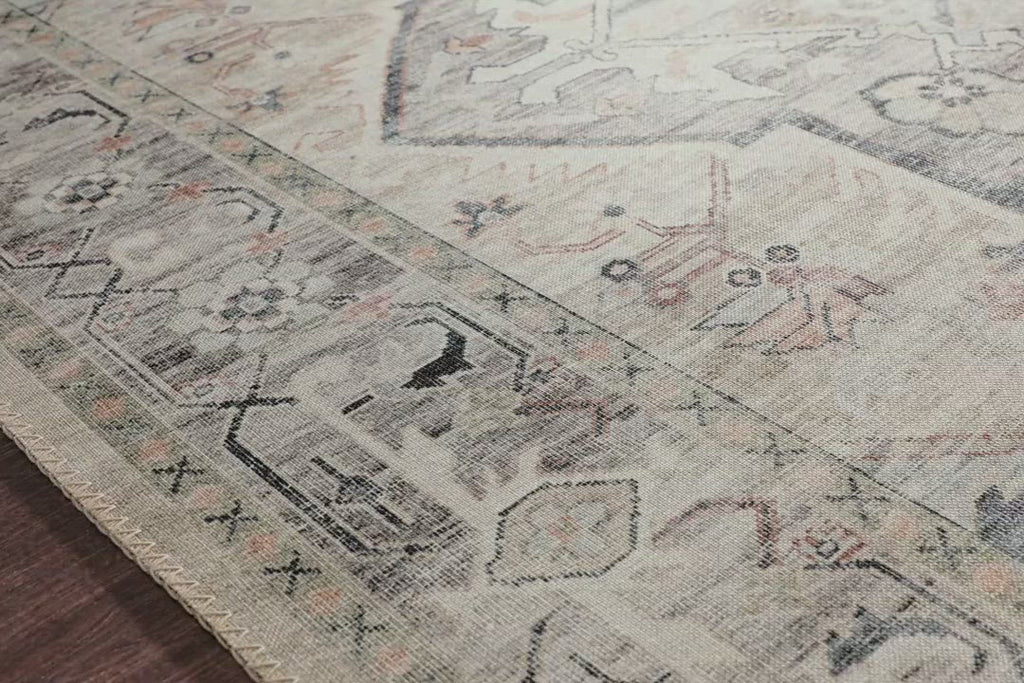 Featuring soft motifs in a carefully curated color palate of ivory, blue, green, and hints of purple, the Hathaway Multi / Ivory area rug captures the essence of one-of-a-kind vintage or antique area rug at an attractive price.