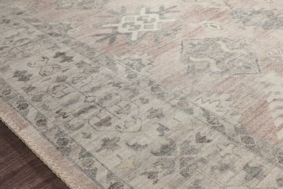 Featuring soft motifs in a carefully curated color palate of ivory, red, grey, and hints of blue, the Hathaway Java / Multi area rug captures the essence of one-of-a-kind vintage or antique area rug at an attractive price.