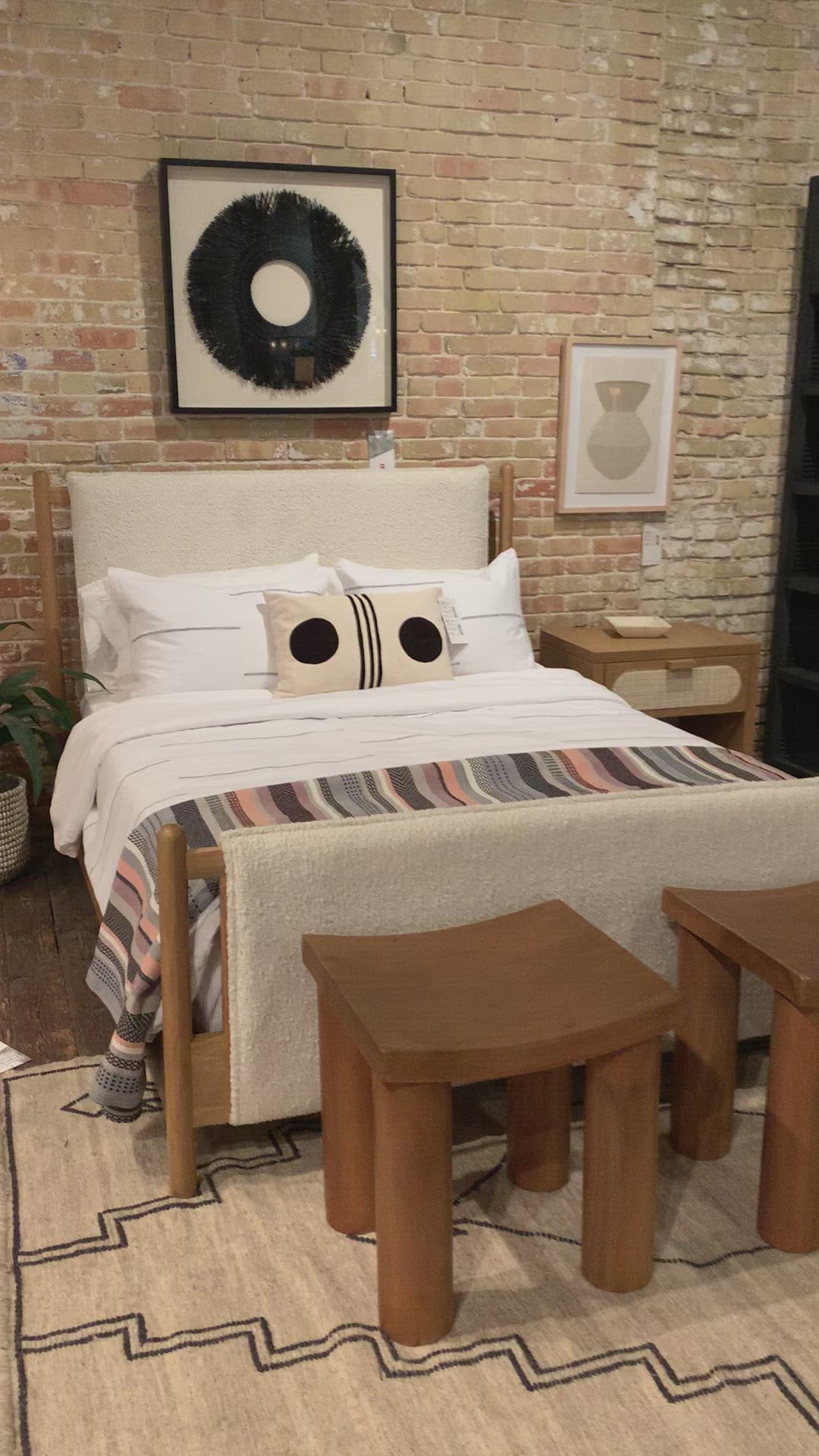 Load video: Bring a cozy hygge vibe to the bedroom with this textured Bowen Bed. Framed by light-finished solid oak, a sling-style bed features faux shearling head and foot boards -- sure to elevate any bedroom.   Queen Overall Dimensions: 64.25&quot;w x 87.25&quot;d x 48.00&quot;h King Overall Dimensions: 80.25&quot;w x 88.50&quot;d x 48.00&quot;h